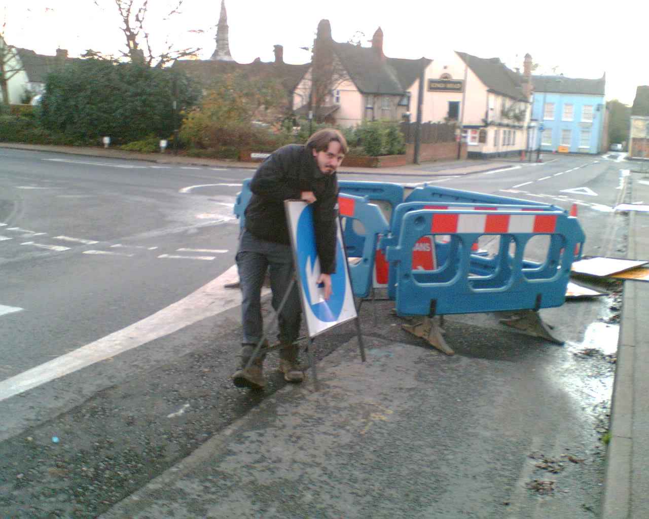 Phil with a road sign